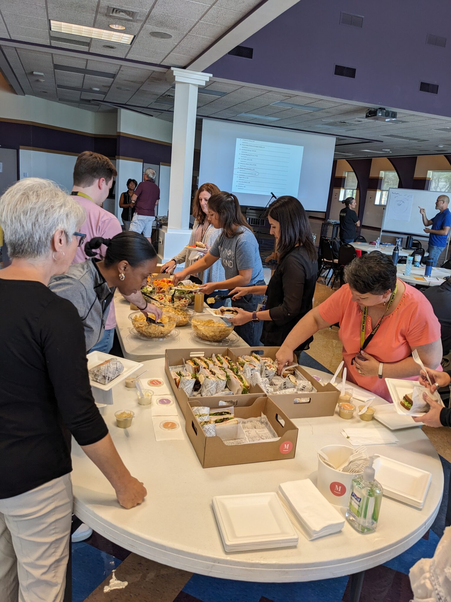 Teachers getting lunch at professional development