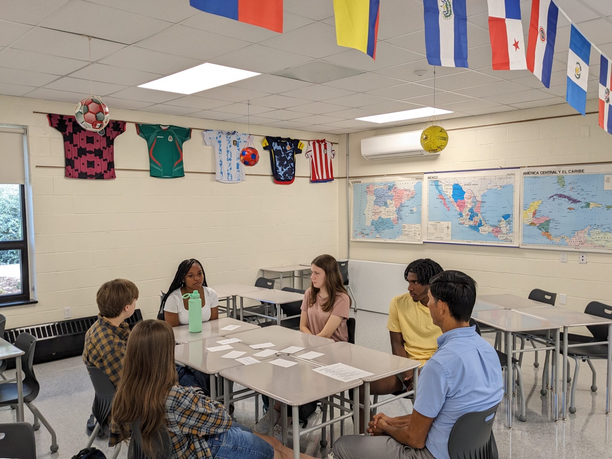 Students sitting around desks