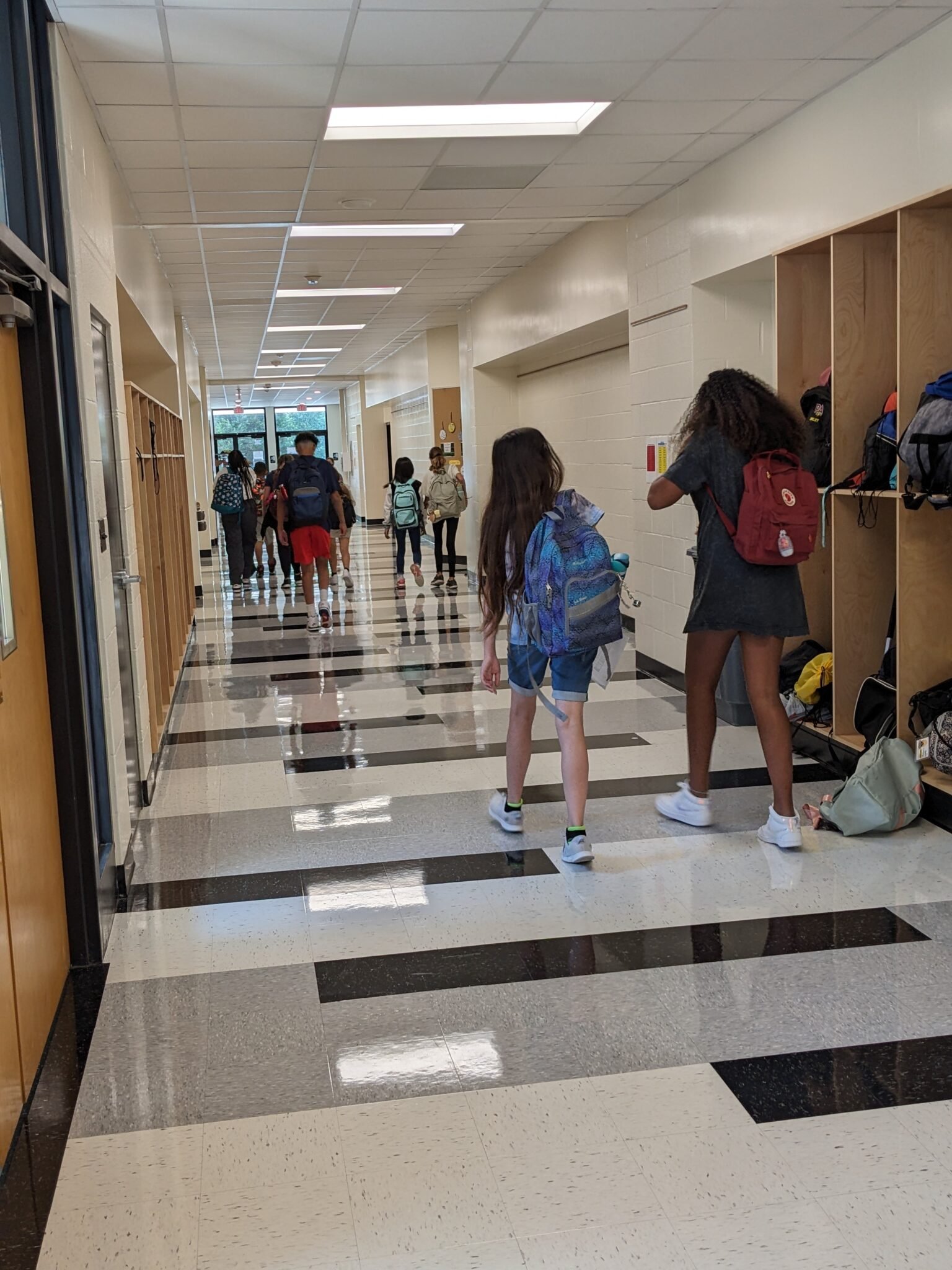 Middle School Students walking the hall