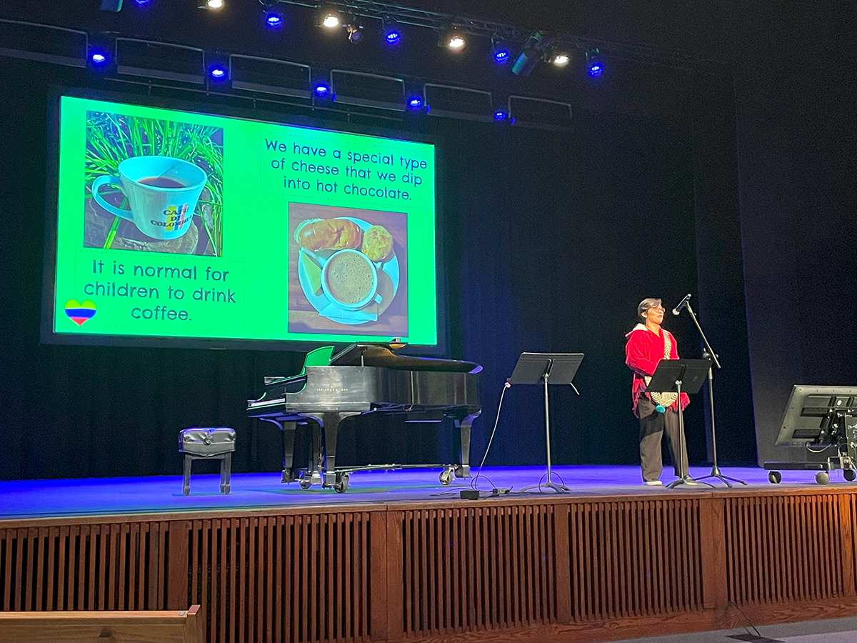 Teacher speaking at Chapel