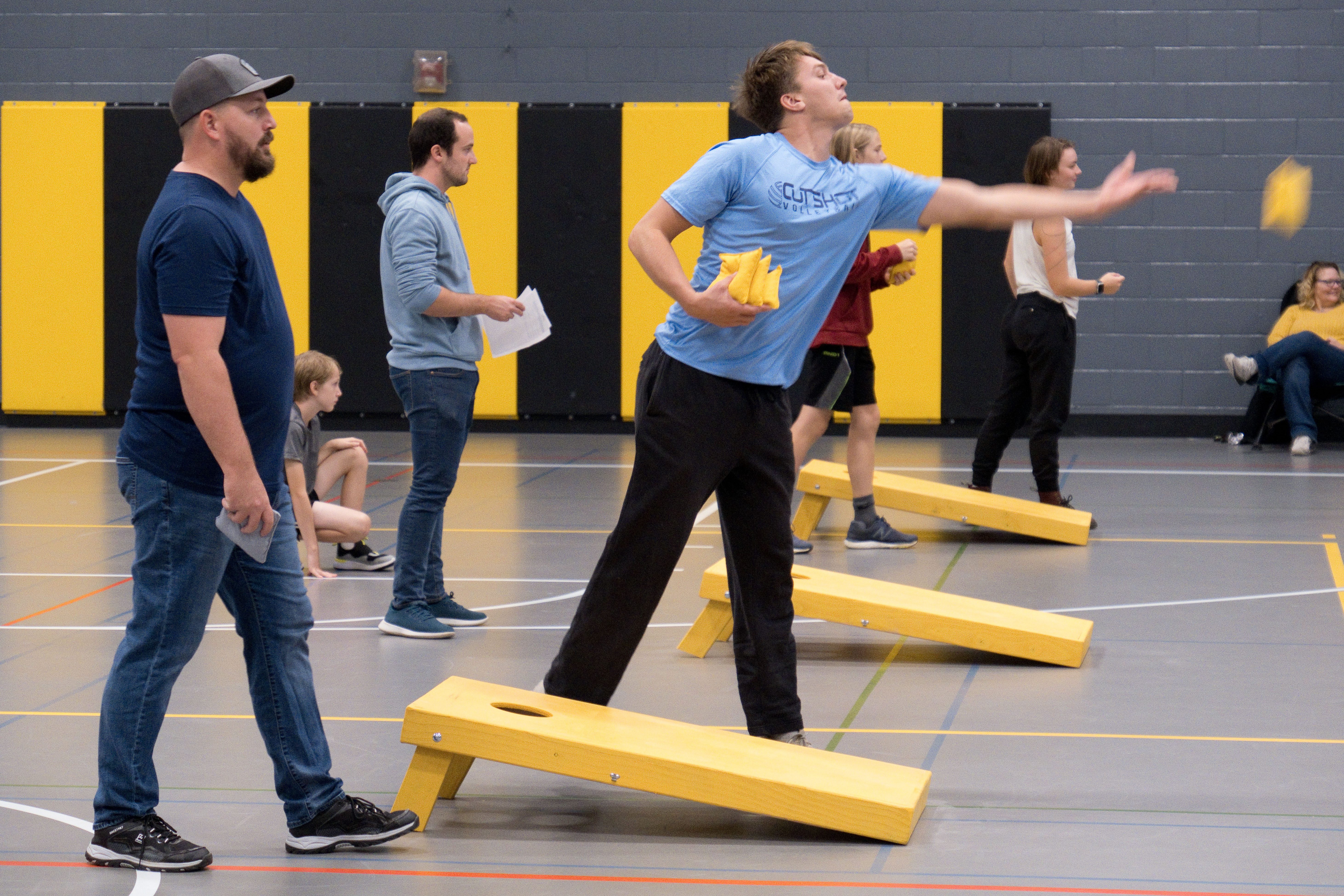 Cornhole tournament participants