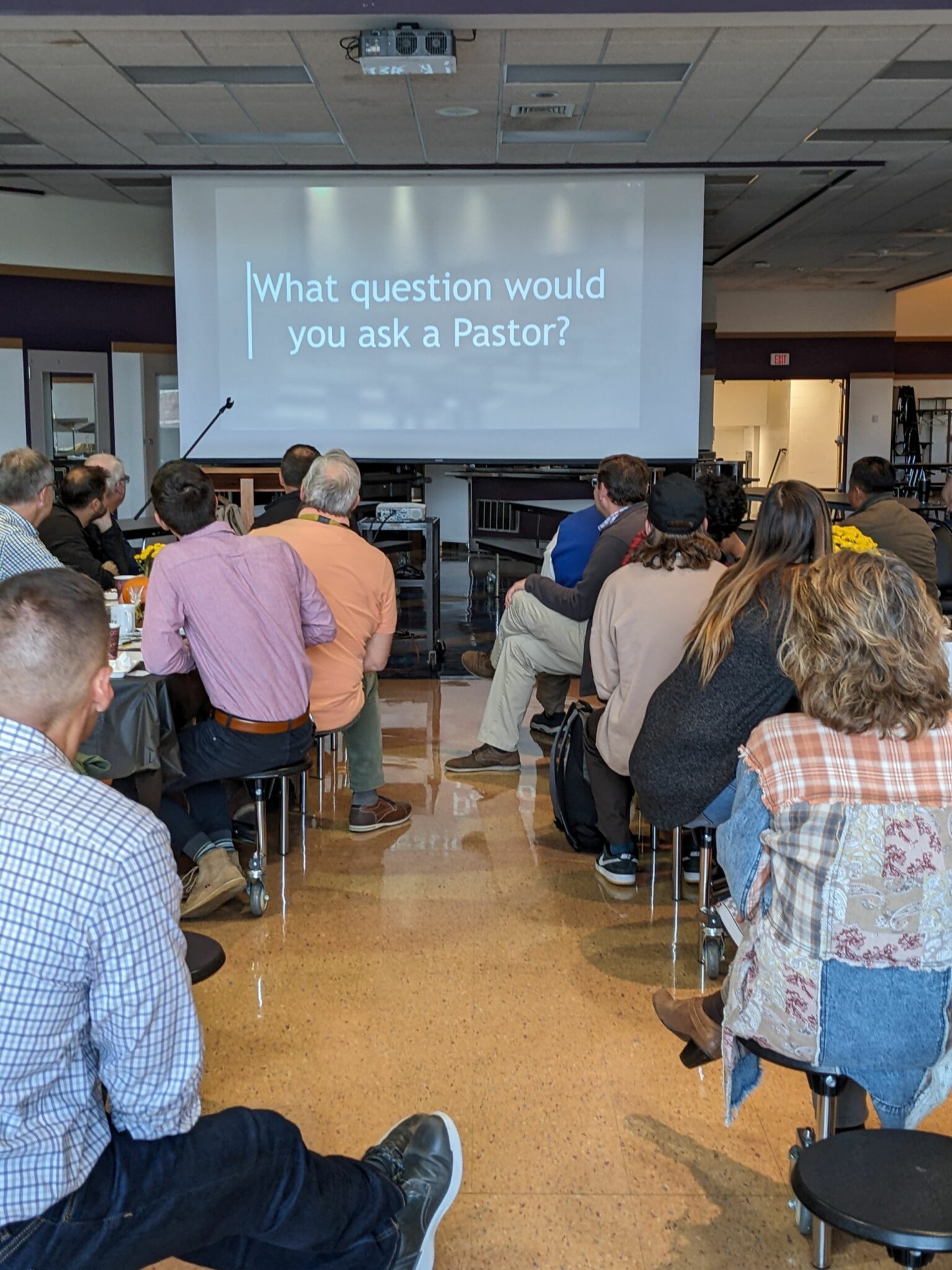 Pastor's watching a video students made
