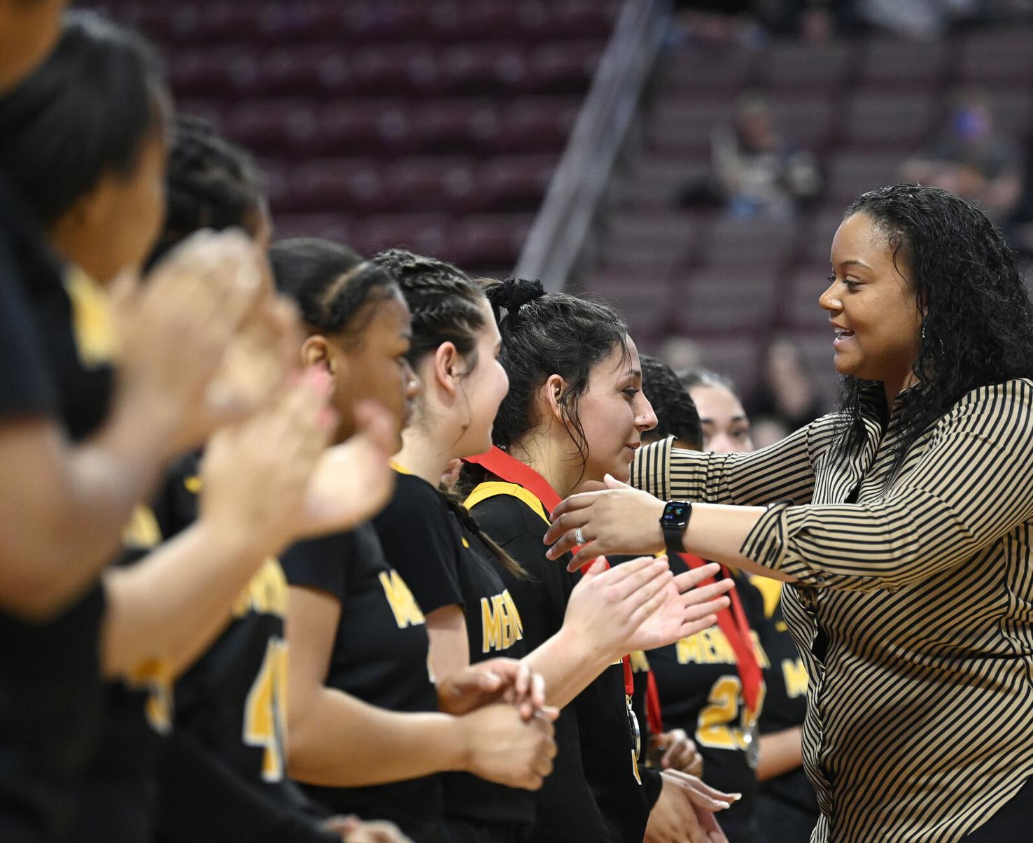 Teasia Myers-Pena with LM Girl Basketball Team