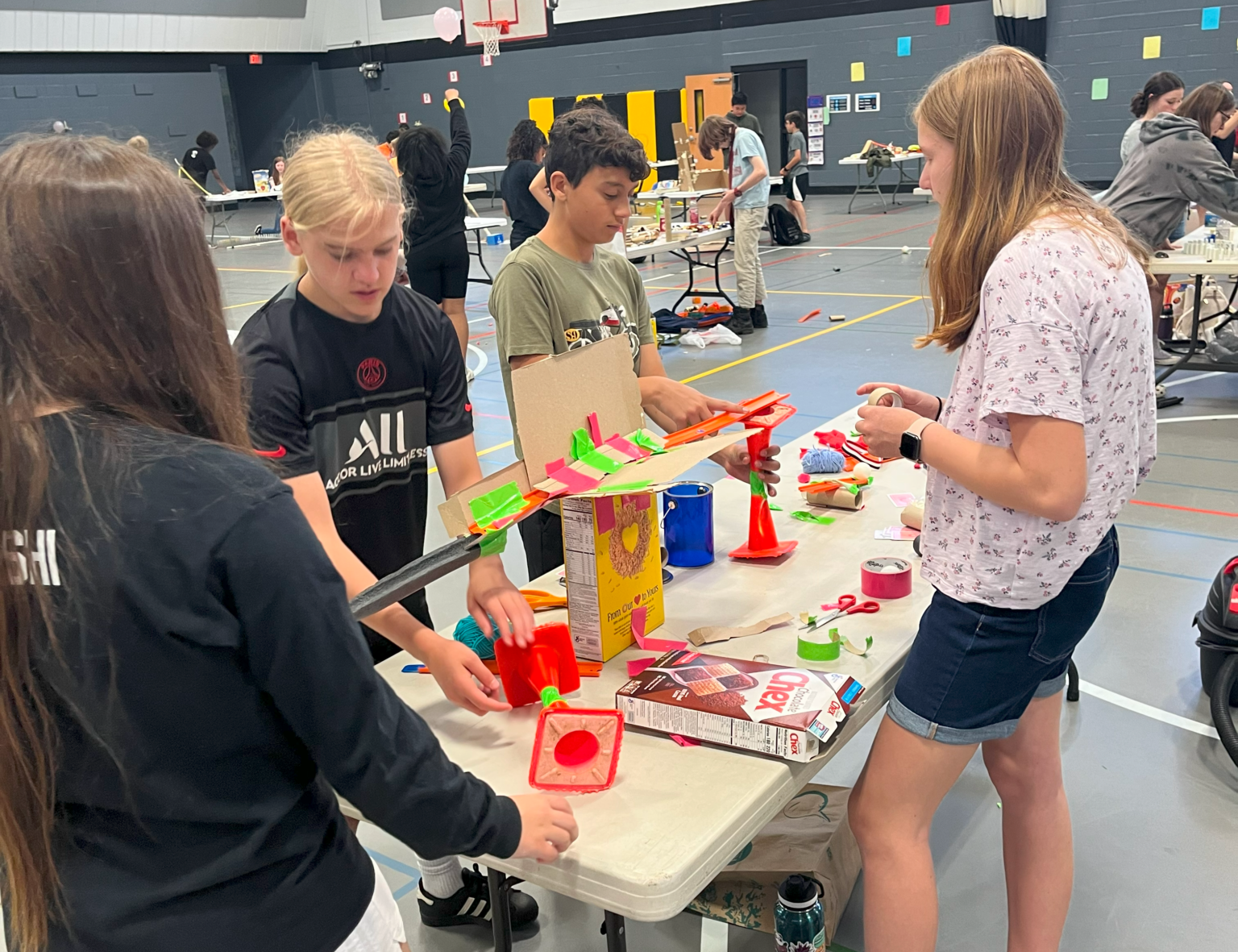 middle school students working on STEM projects