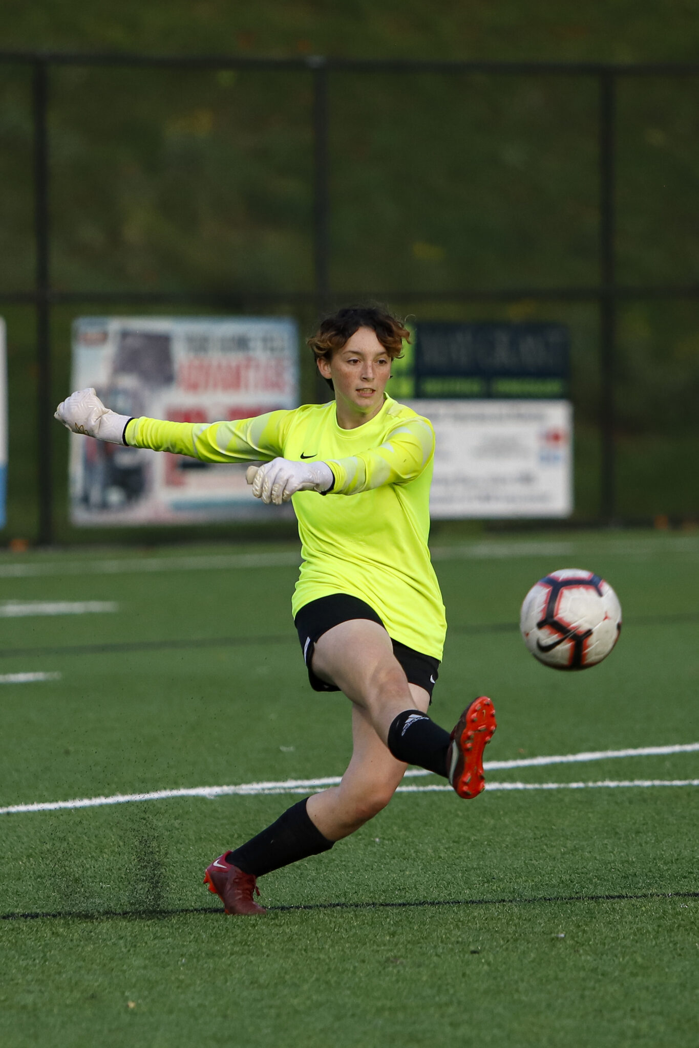 Soccer player kicking the ball
