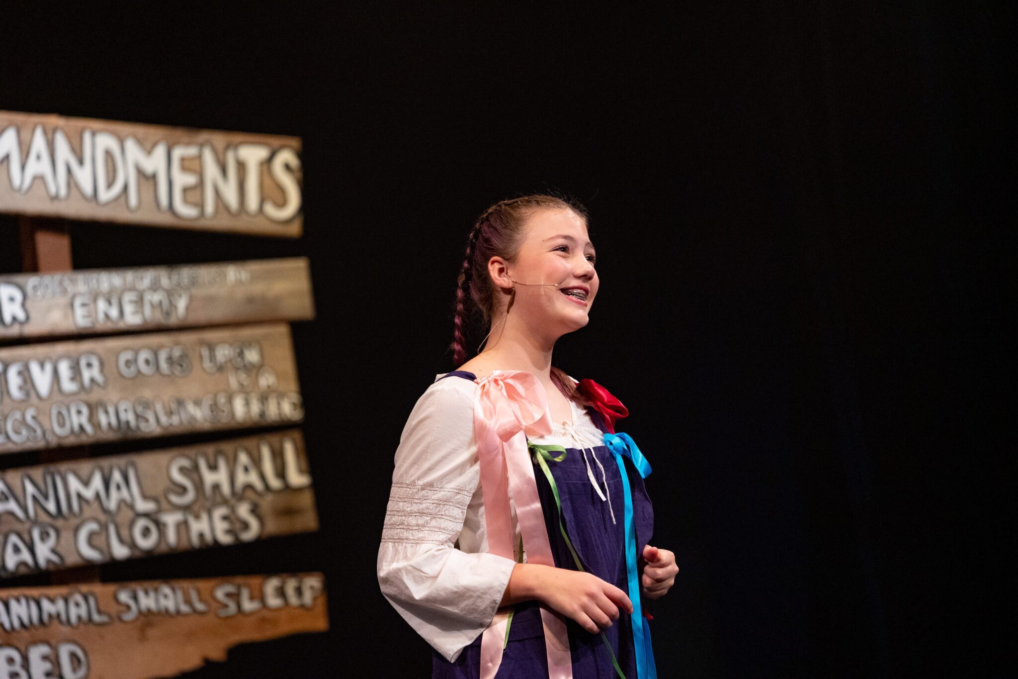 LM student on stage