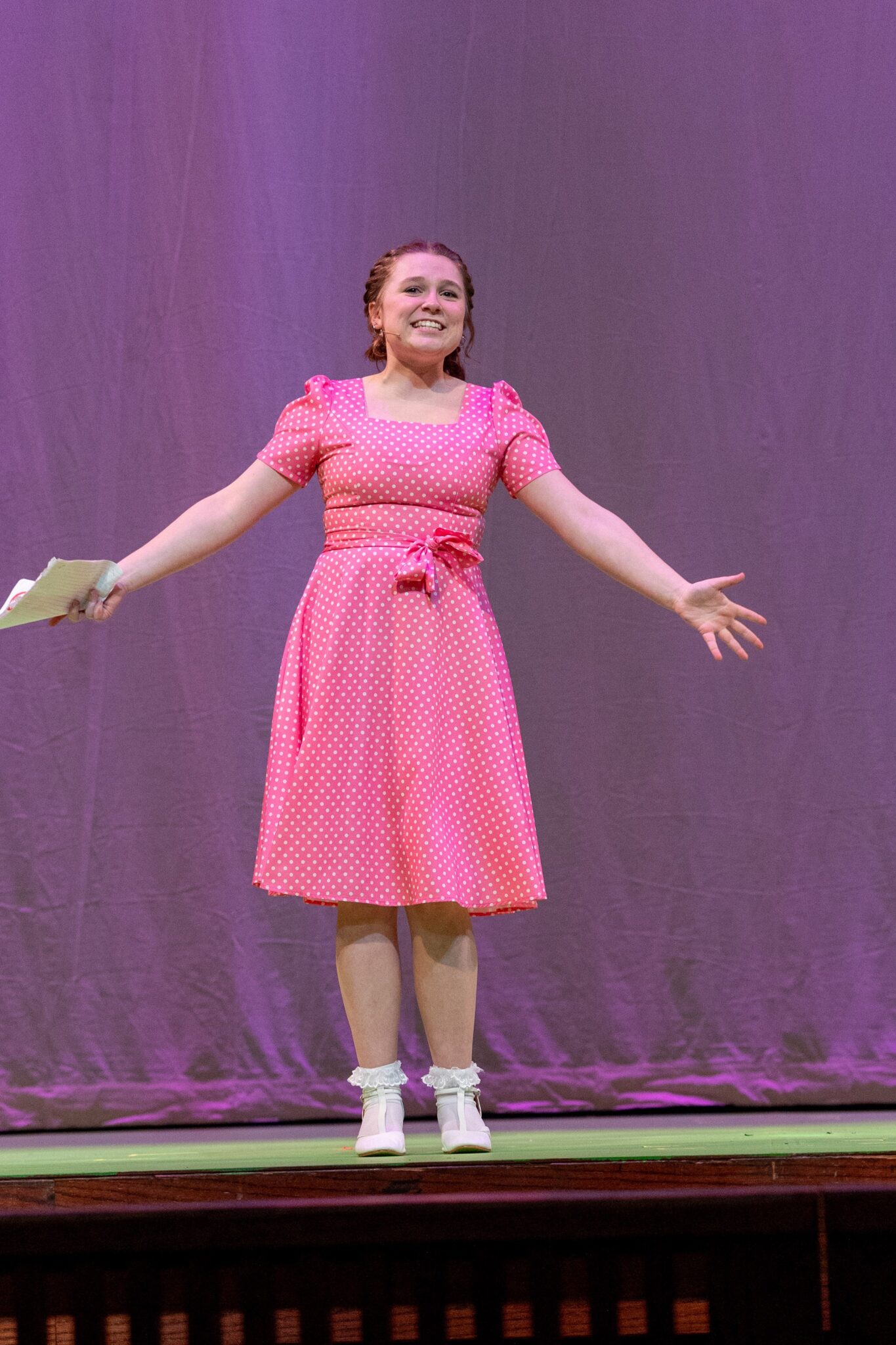 student on stage