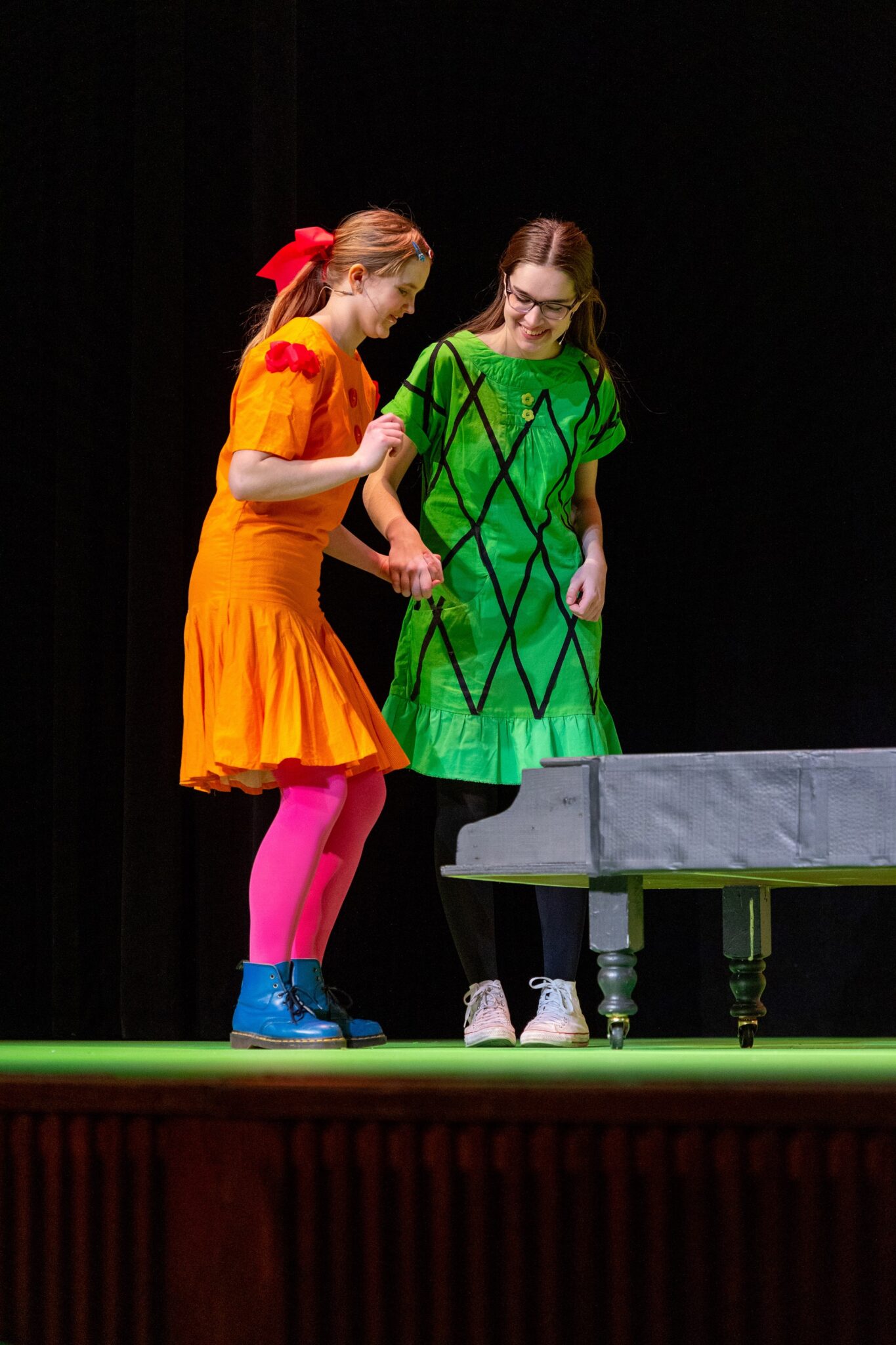 Two students on stage