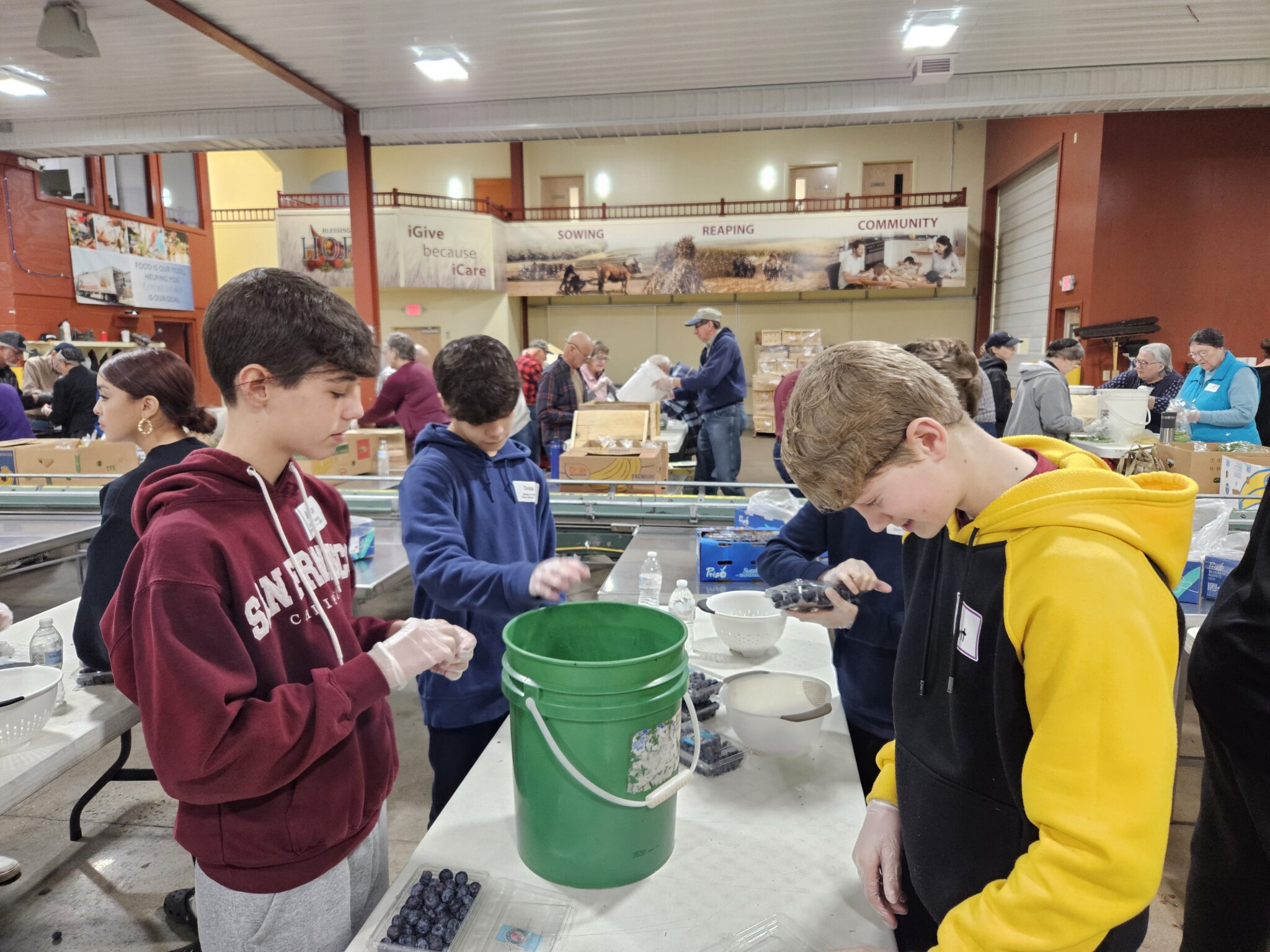 students working on packing kits