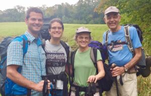 Lois and Ernie hiking on the AT with their children, Phil and Audrey.