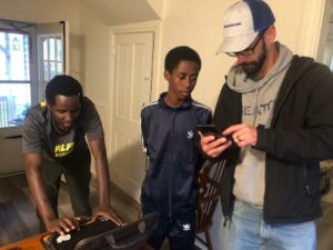 TIM SETTING UP THE INTERNET FOR REFUGEE FRIENDS