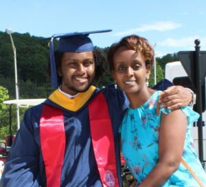 HAMELMAL YOHANNES GERMAMO ‘93 WITH HER SON, SELAME, AT HIS GRADUATION