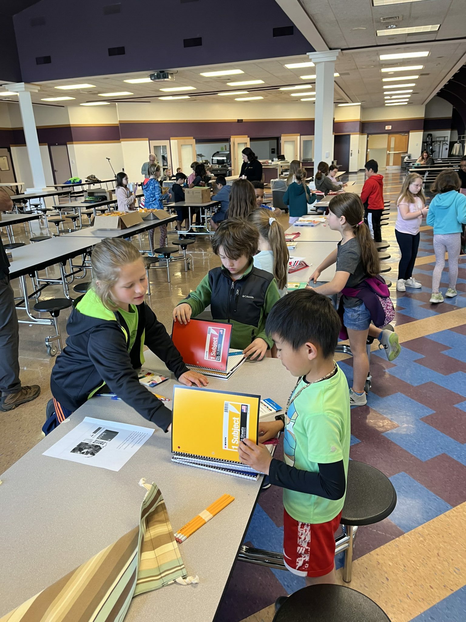 LM students packing school kits