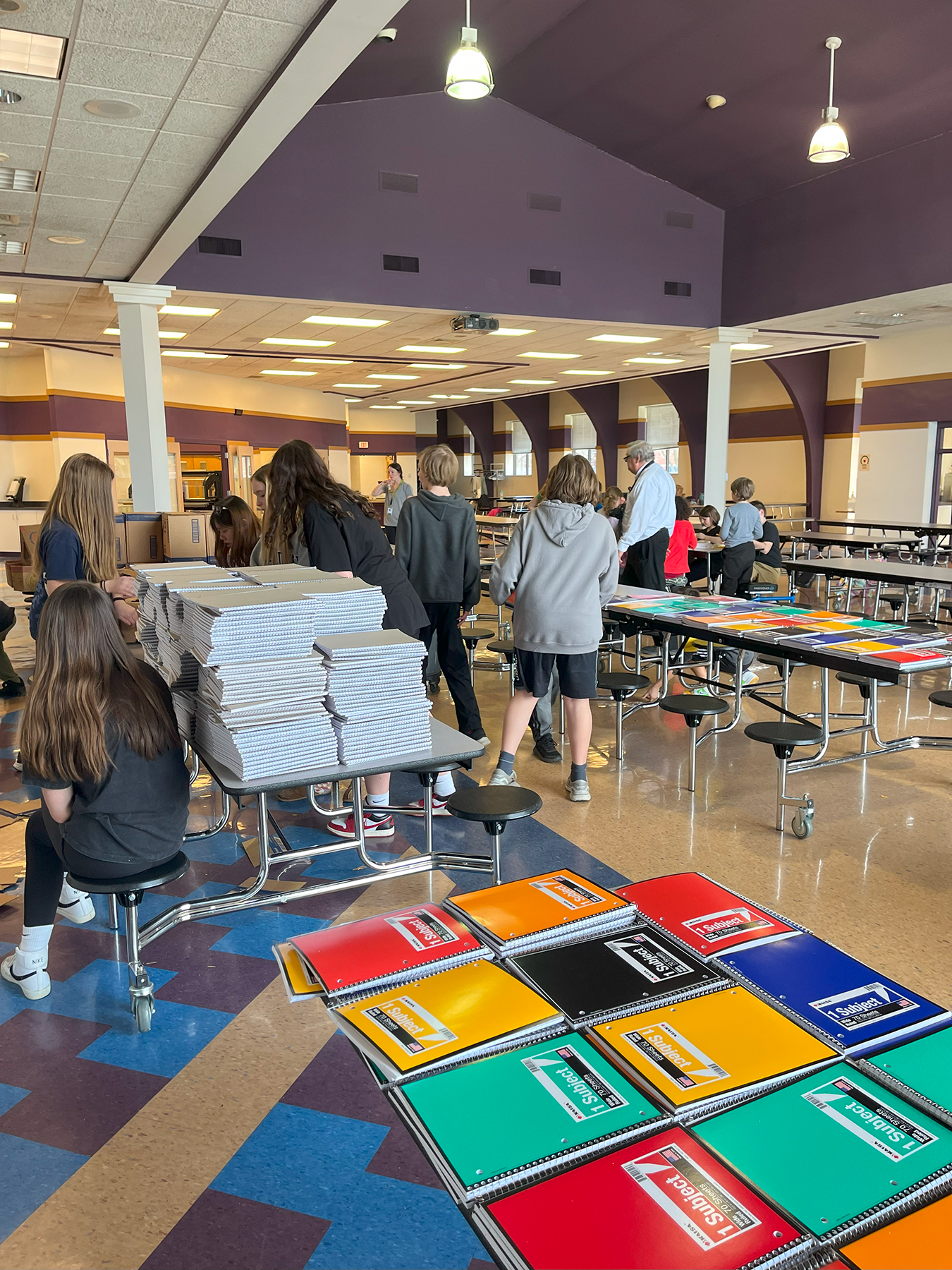 students packing up kits