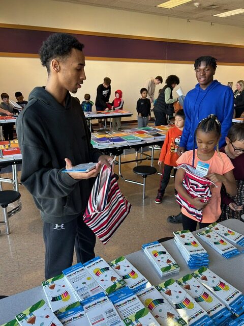 Students packing school kits during World Changers Week.