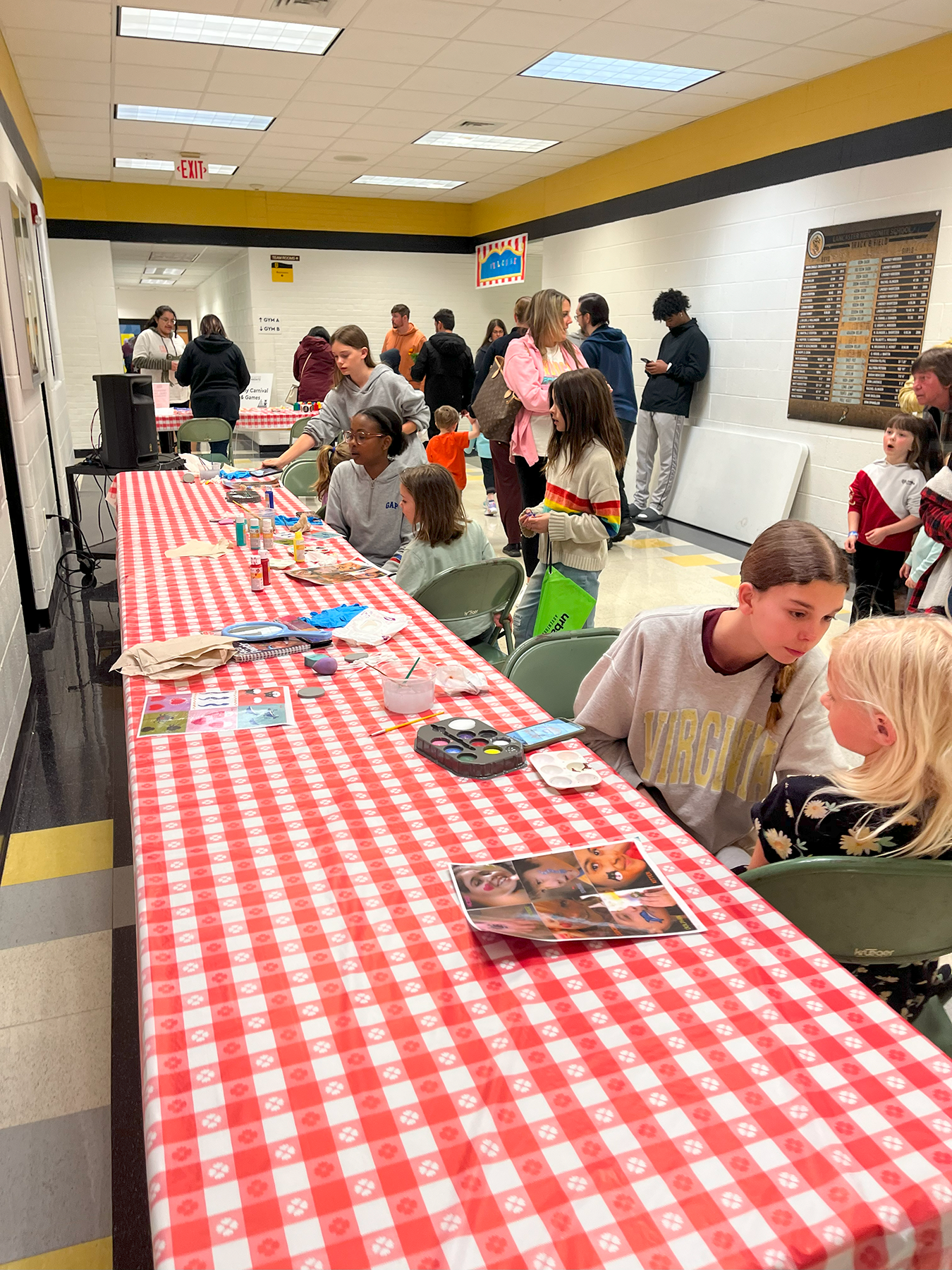 Students doing face painting