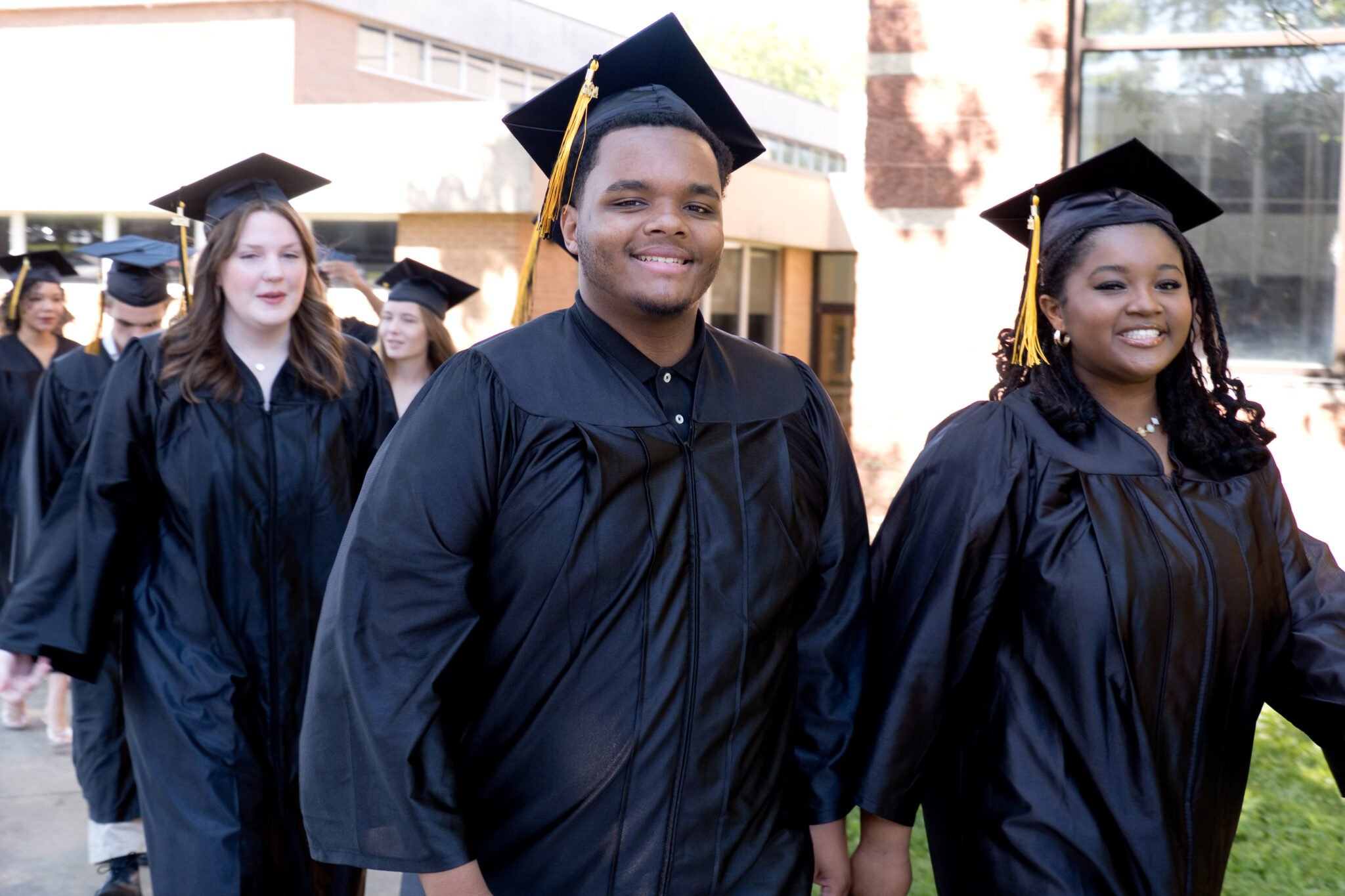 Class of 2024 walking to graduation