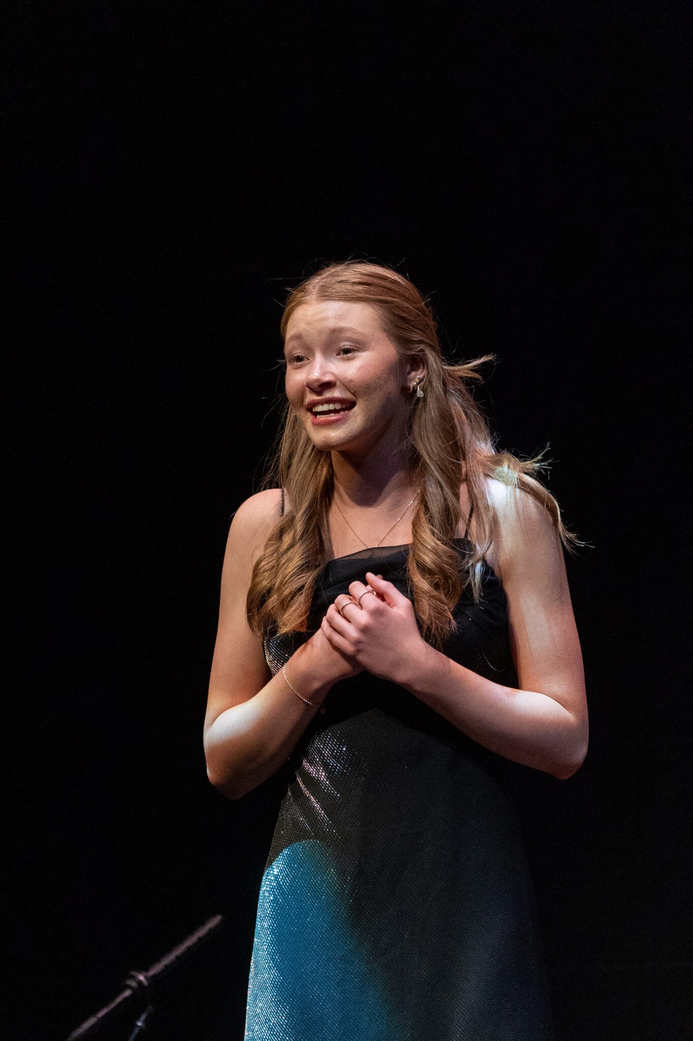 Student on stage at Spring Showcase