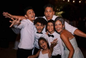 PHOTO: MIKE, HIS WIFE, ADIENEZ, AND THEIR FOUR KID