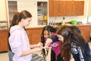 LM students working on a project