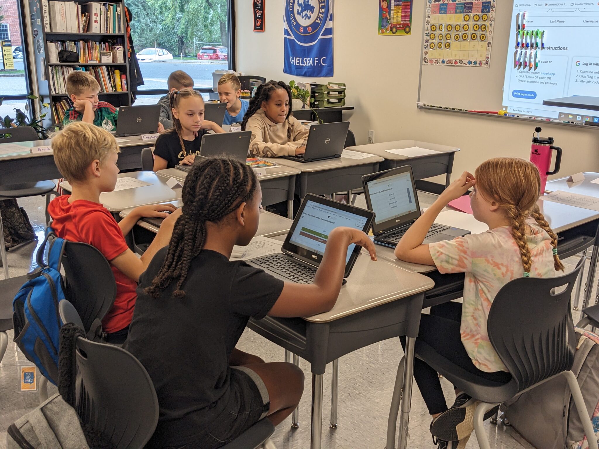students working on their laptops