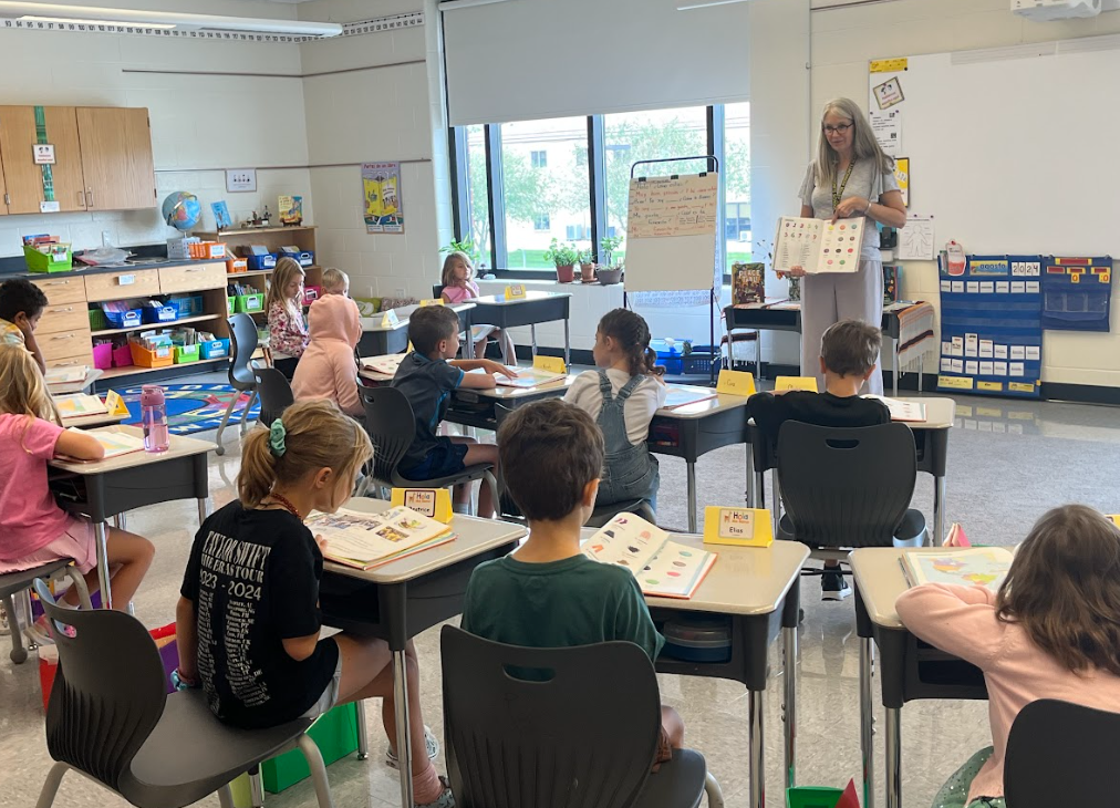 Teacher reading to students
