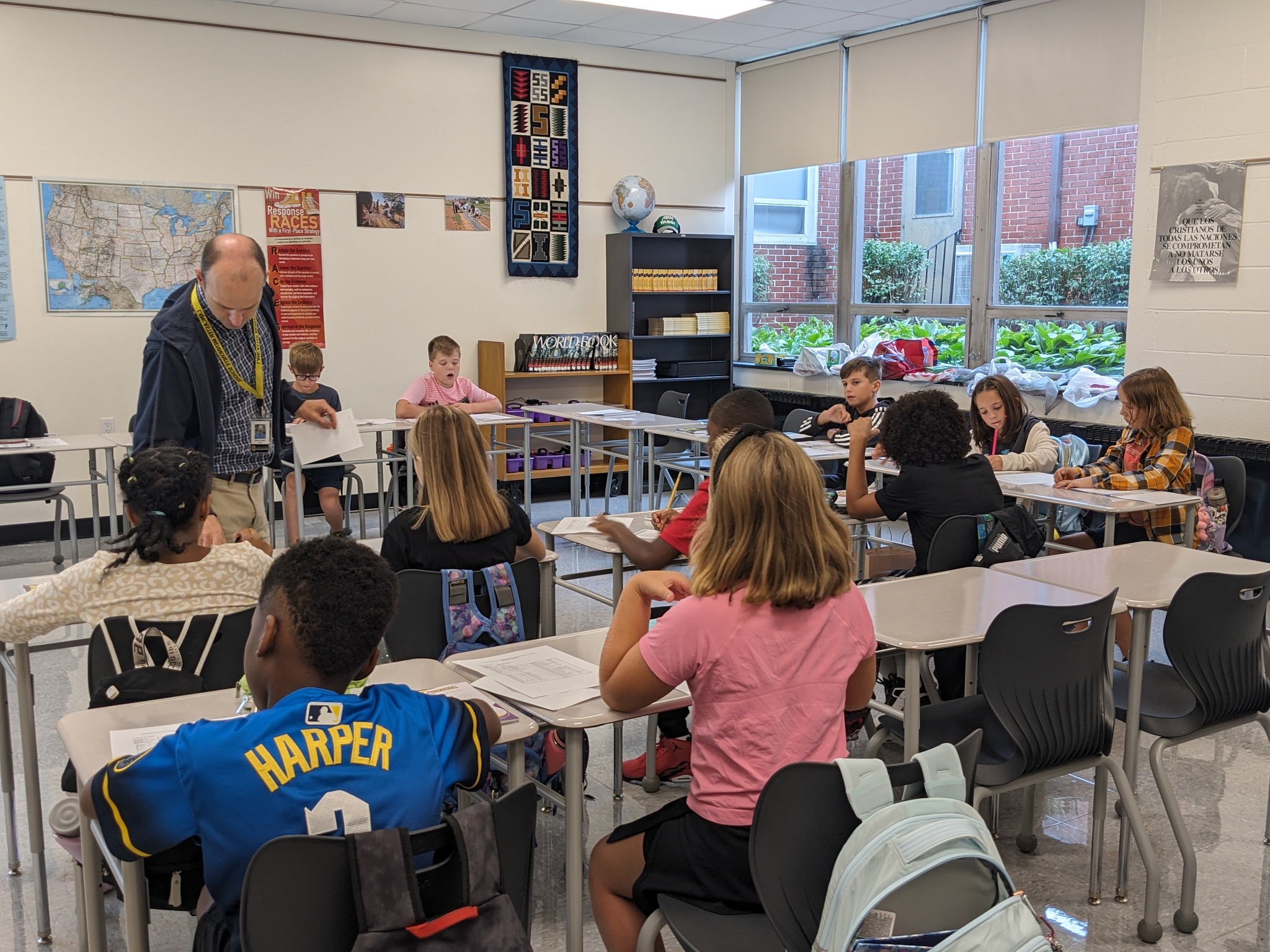 Middle School students doing work at their desks