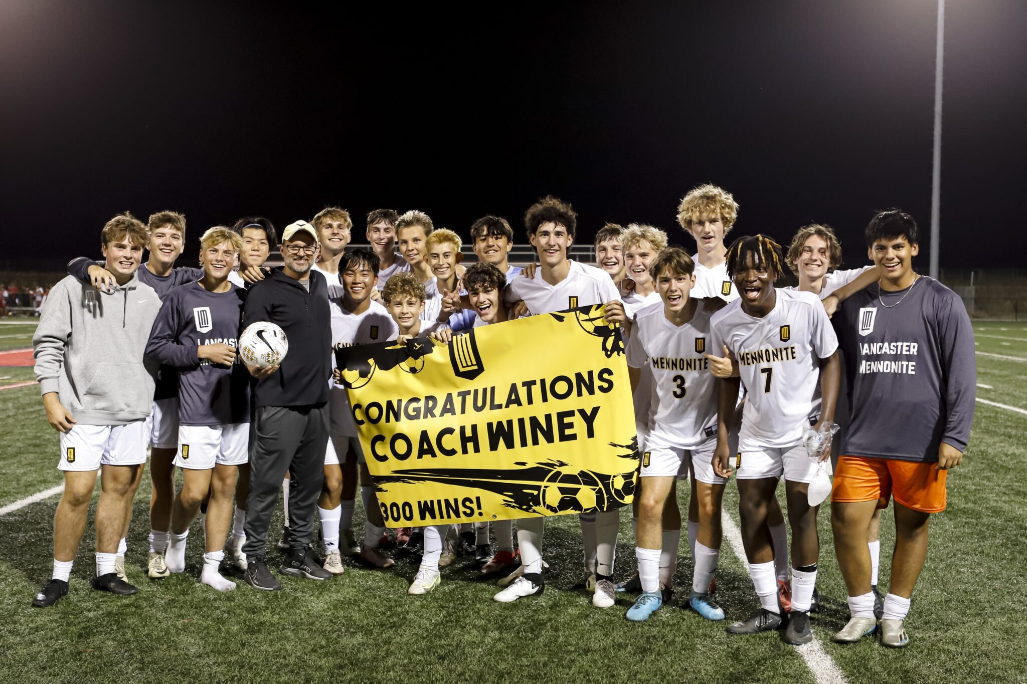Boys soccer team with Mr. Winey