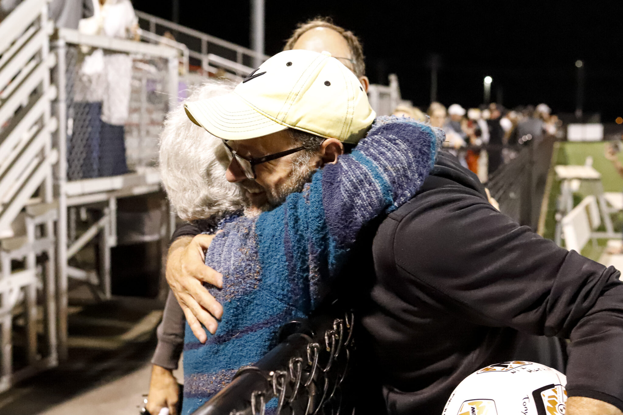 Mr. Winey hugging after 300th win.