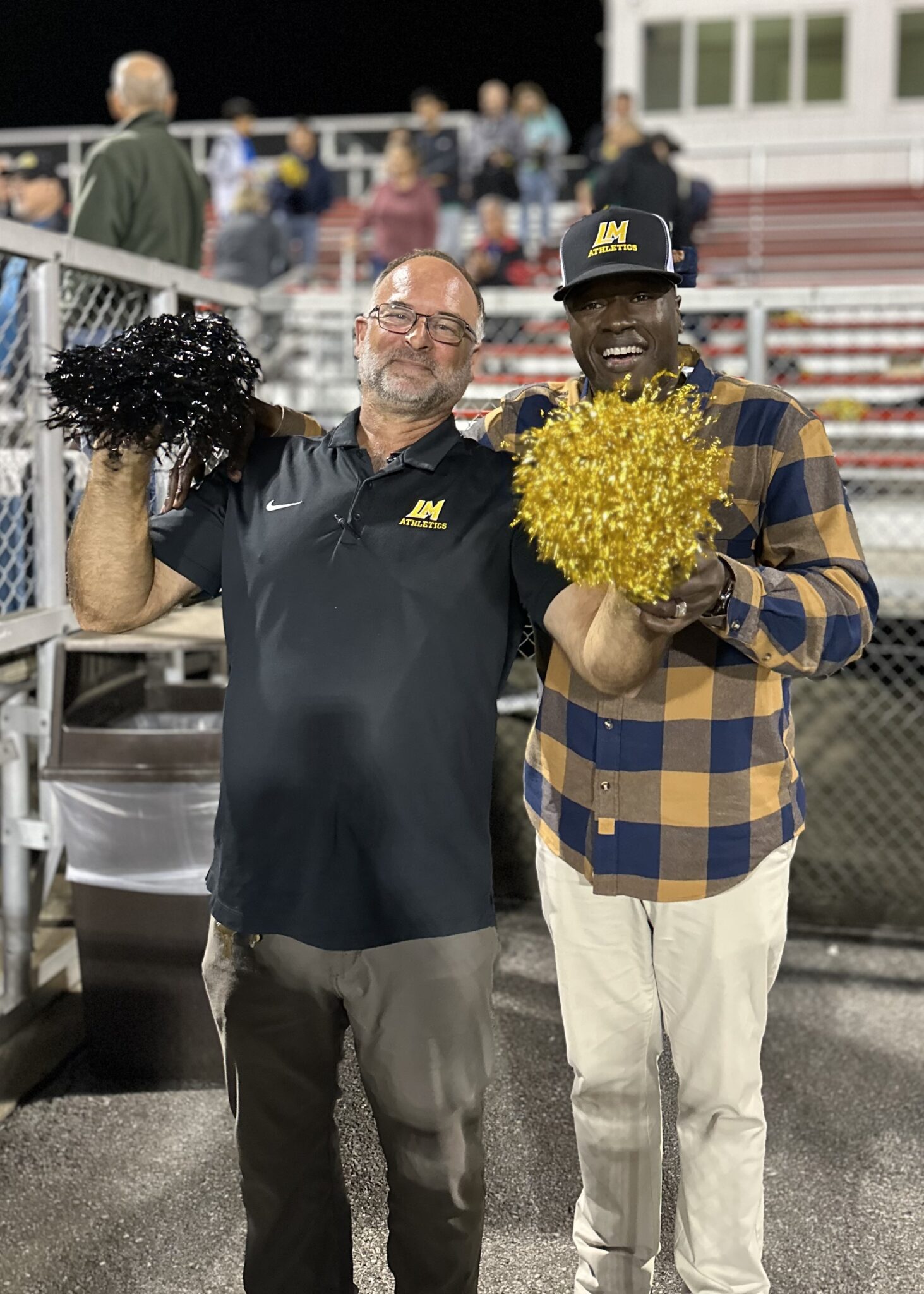 Dr. Badriaki and Mr. Sauder at soccer game.