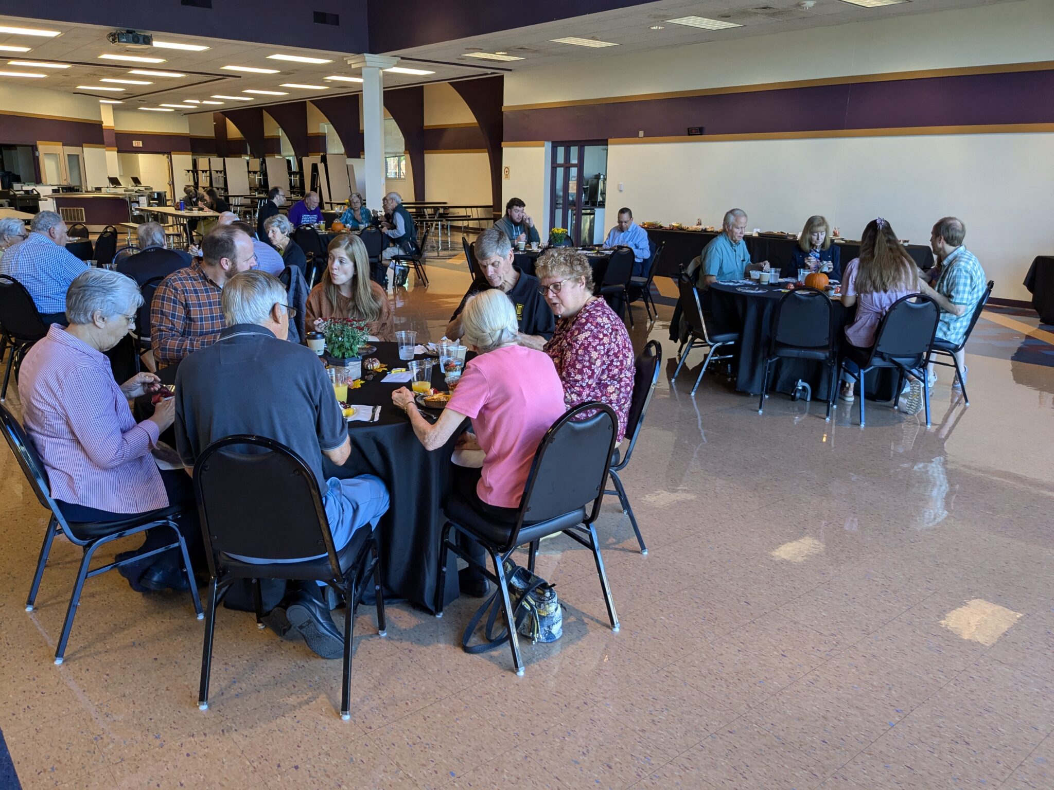people gathered at the superintendent breakfast