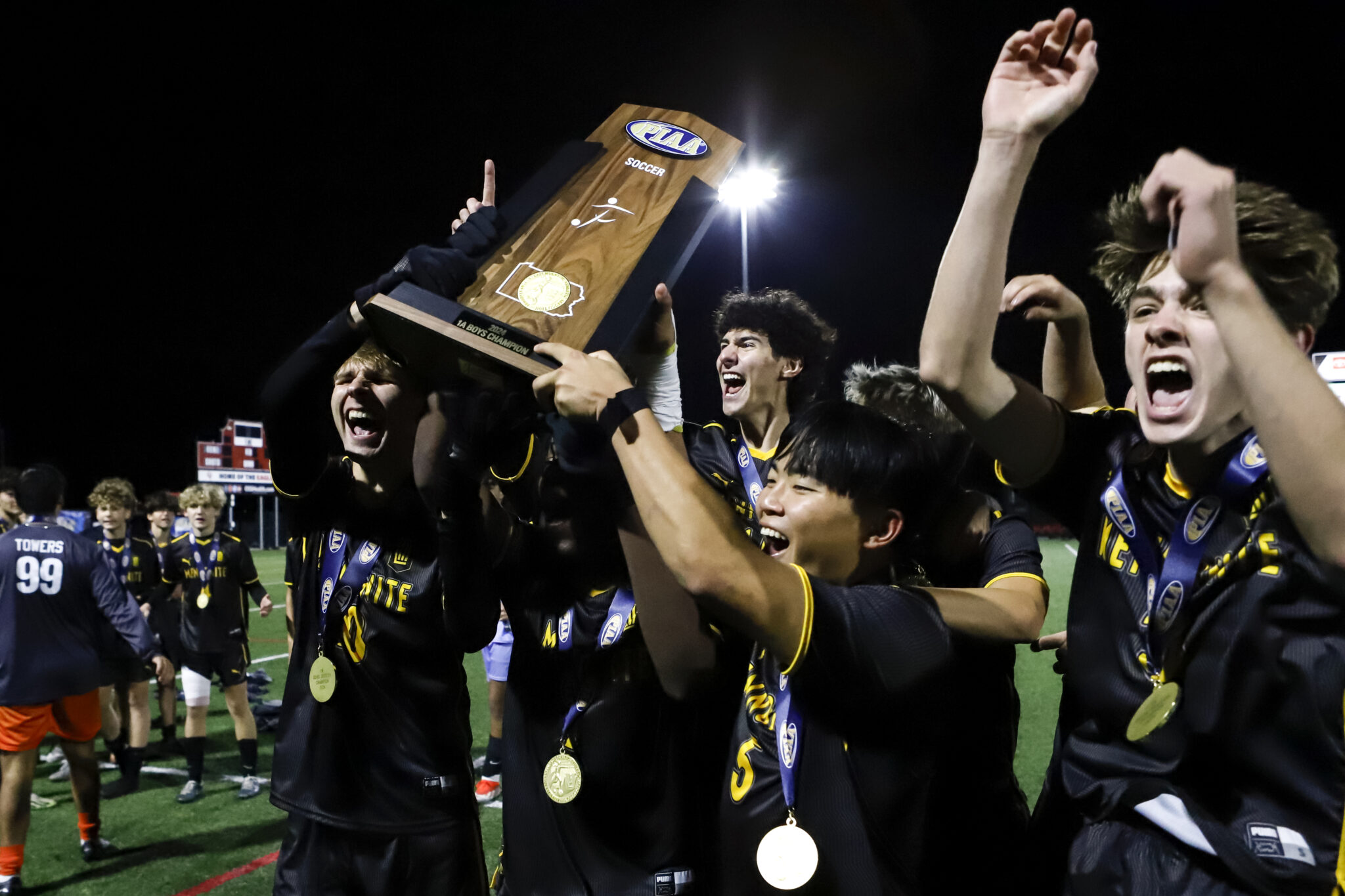 Boys Soccer Team celebrating
