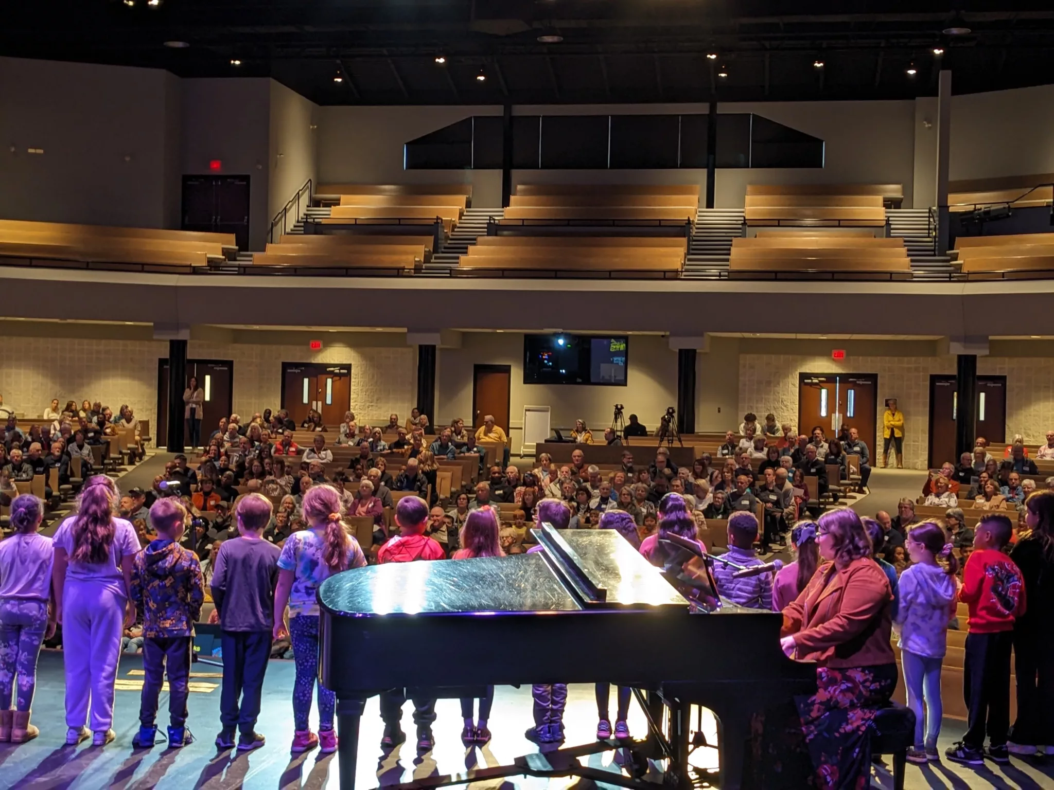 Students singing in Chapel during Grandparents Day