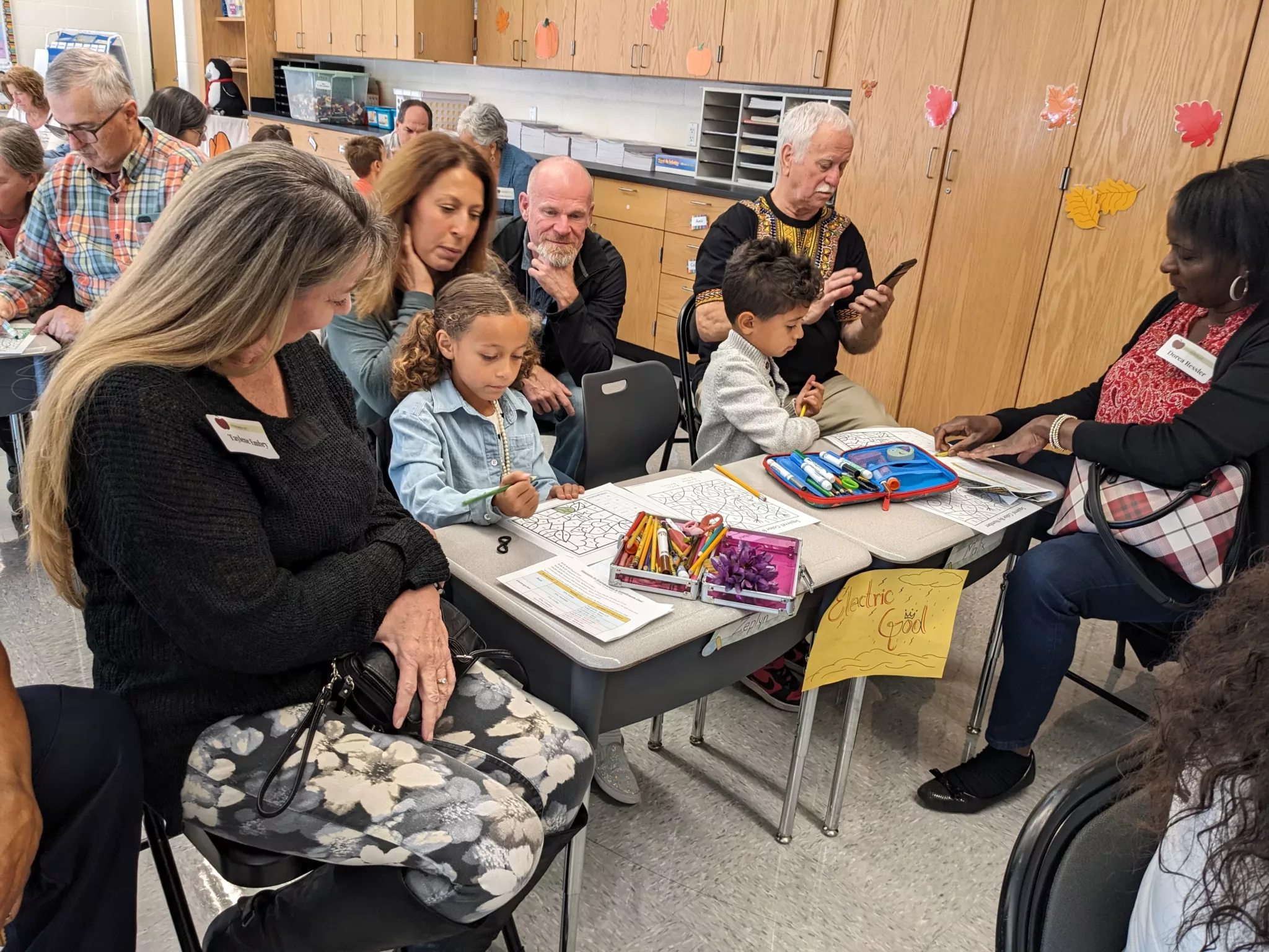 Student with grandparents at Grandparents Day