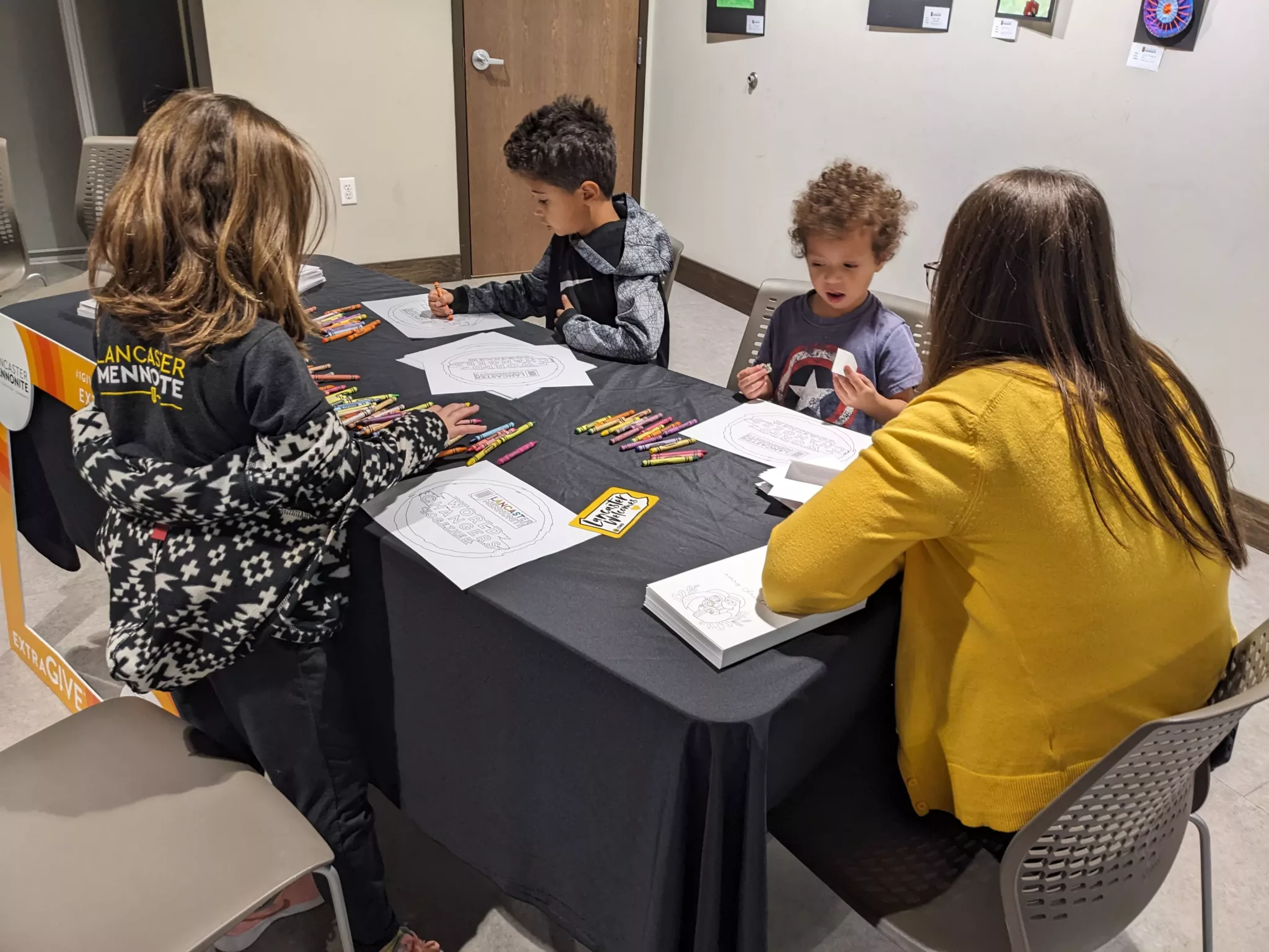 Students coloring at ExtraGive Event