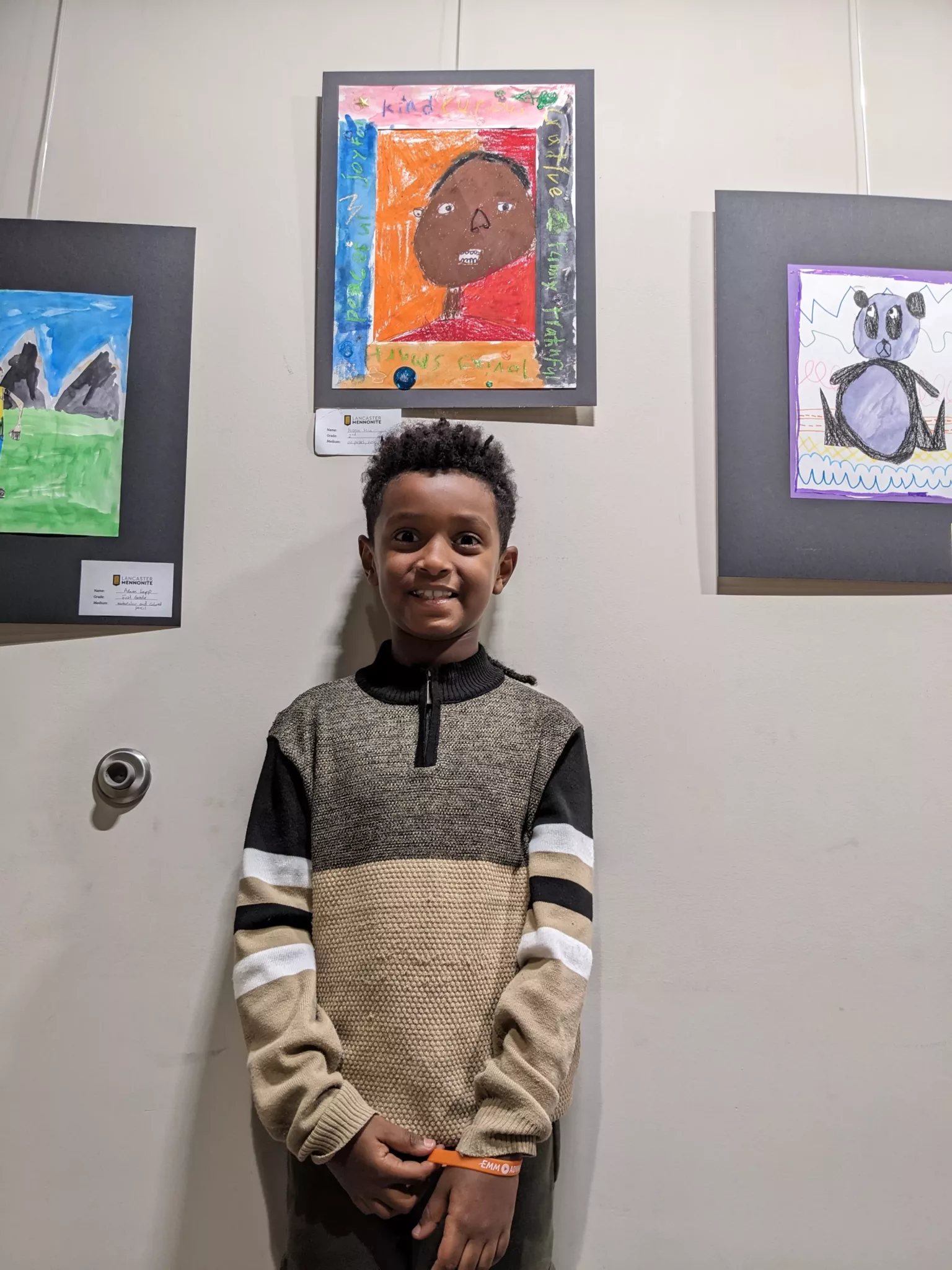 Student with artwork at ExtraGive Event
