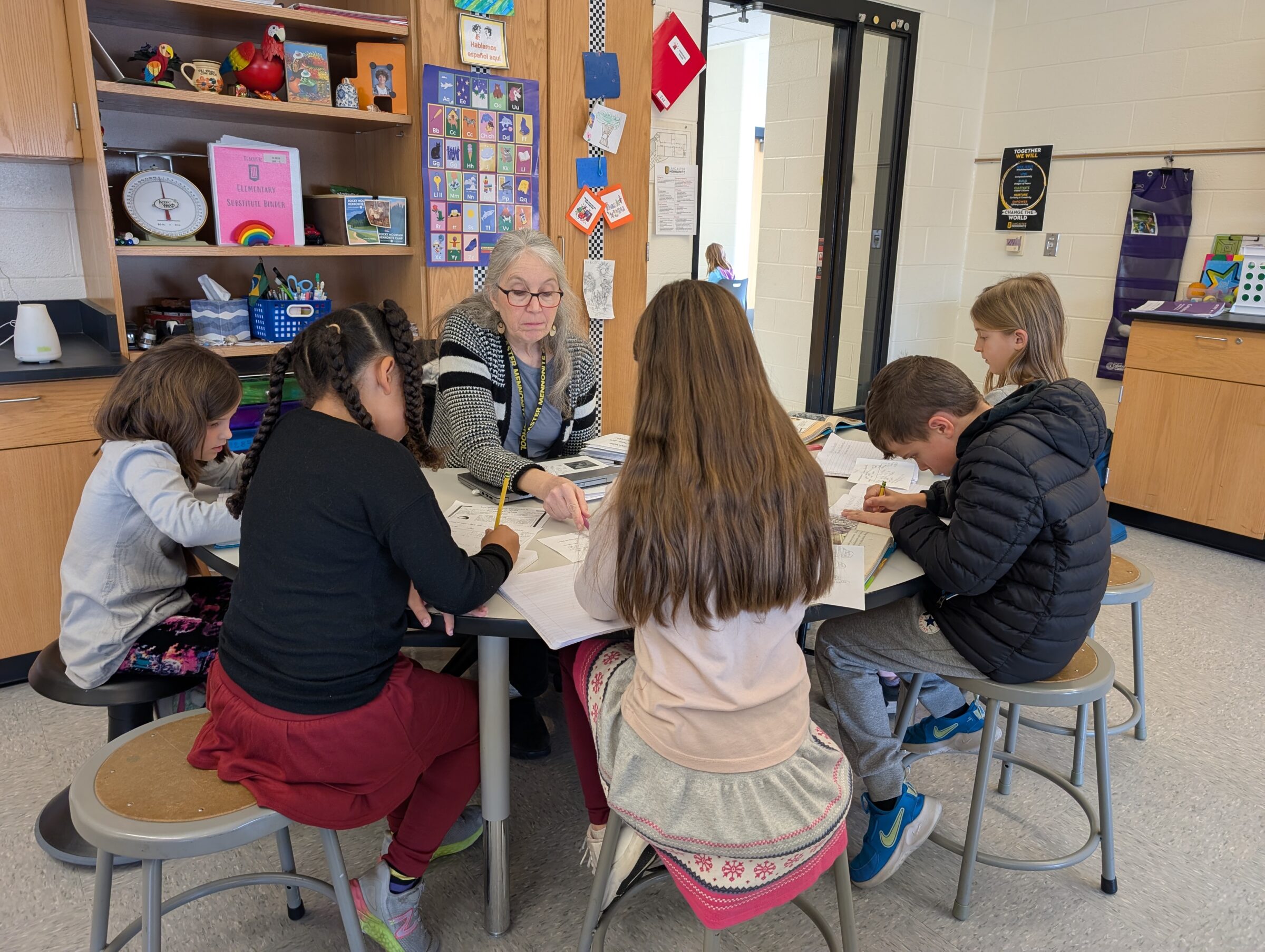 Teacher Mrs. Kaczor with second grade students