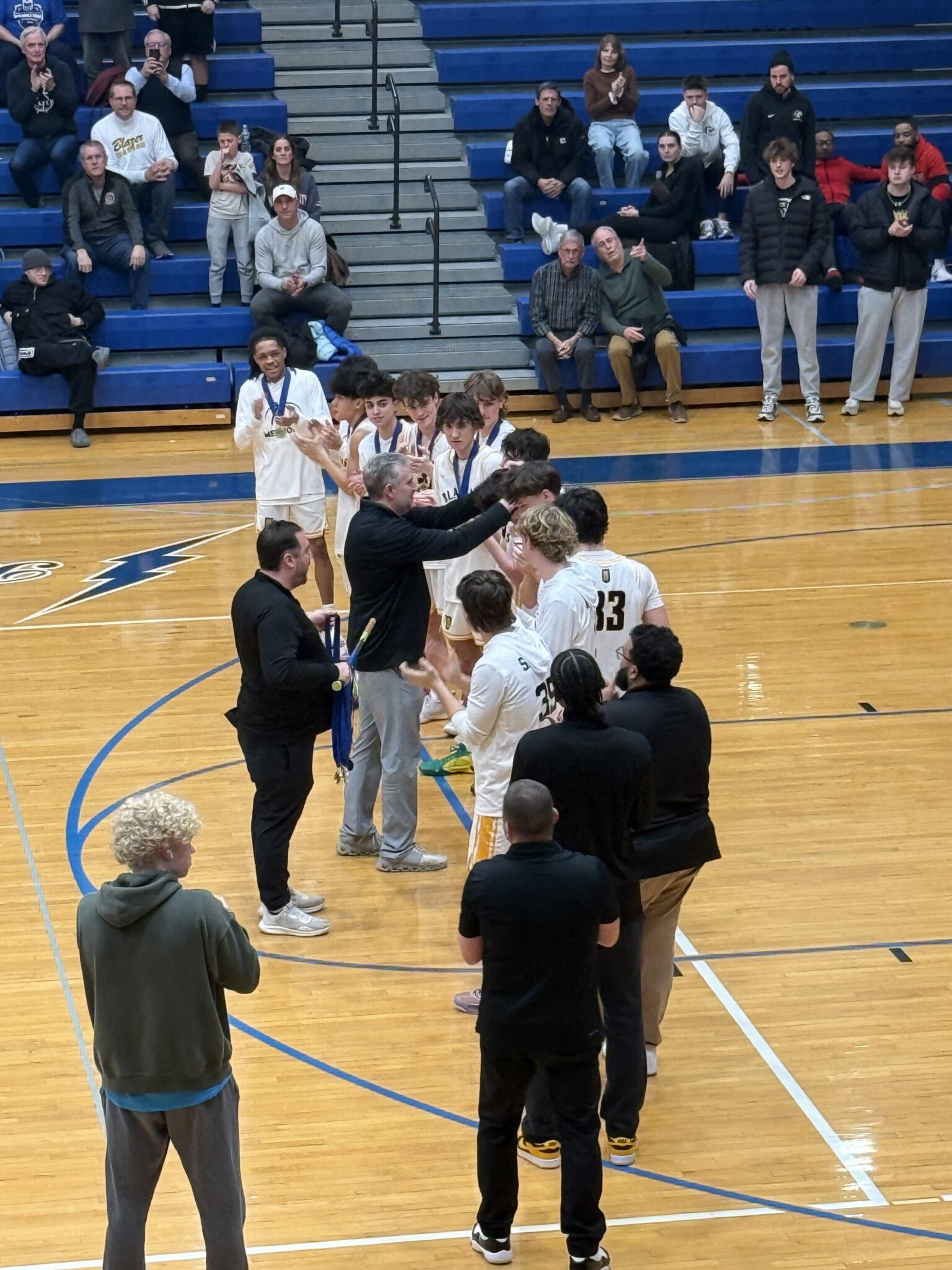 LL League championship boys basketball game 2026 - LM boys team getting their medals