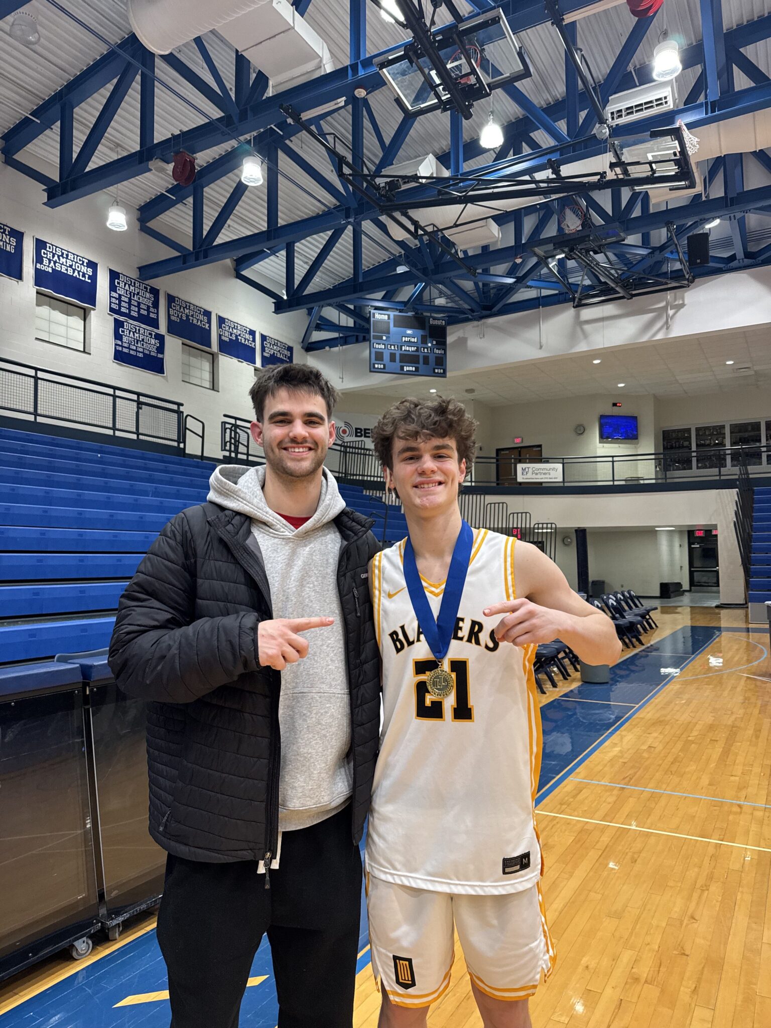 LL League championship boys basketball game 2026 - Camden Hurst and brother Chase Hurst celebrating together