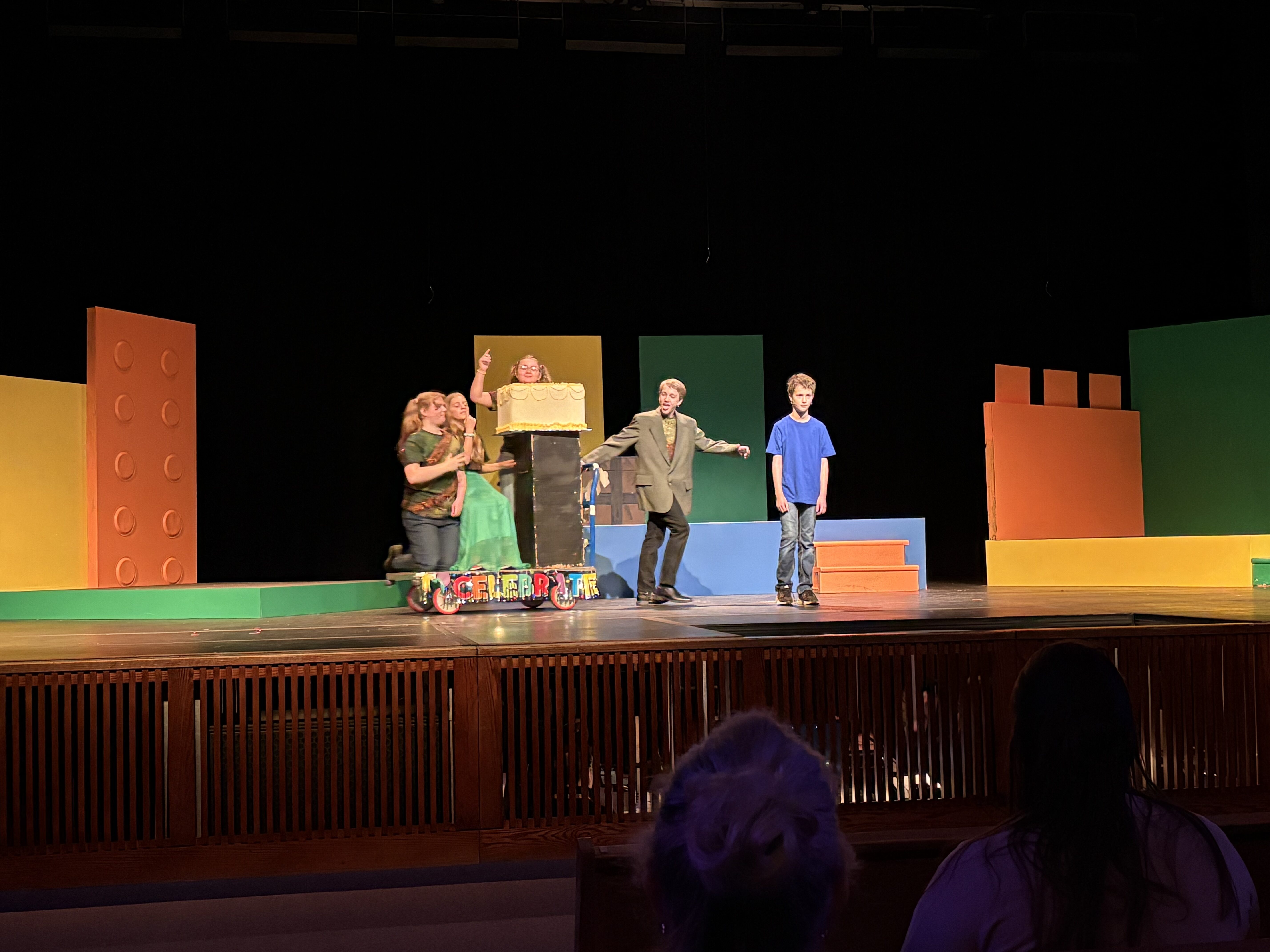 students acting on stage