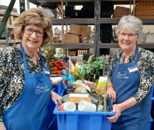ANNE EDELMAN & LORETTA SHARP ‘70 SERVING AT MCC THRIFT STORE. PHOTO CREDITS: KRISTINA MARTIN